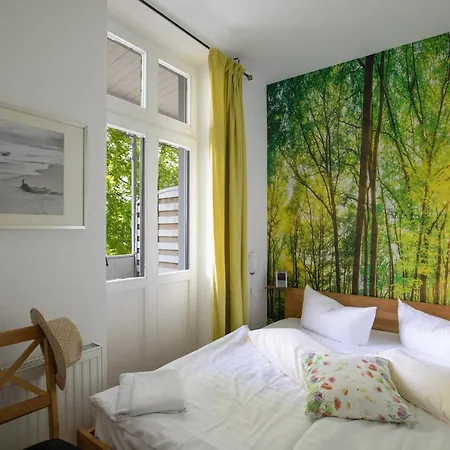 Апартаменты Ferienwohnung Sandburg - Sanssouci Остзебад Бинц